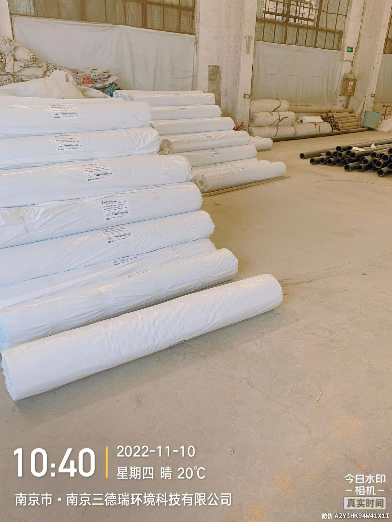 Polymer modified geosynthetic clay liner